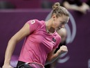 Yanina Wickmayer reacts after winning a point against Petra Kvitova