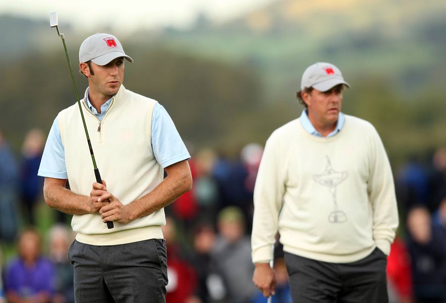 Phil Mickelson trails behind Dustin Johnson