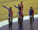 Edward Clancy, Steven Burke, Bradley Wiggins and Geraint Thomas salute the crowd following victory in the Men's Team Pursuit