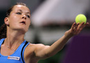 Agnieszka Radwanska tosses the ball up for a serve