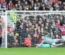 Pepe Reina sees the ball enter his net