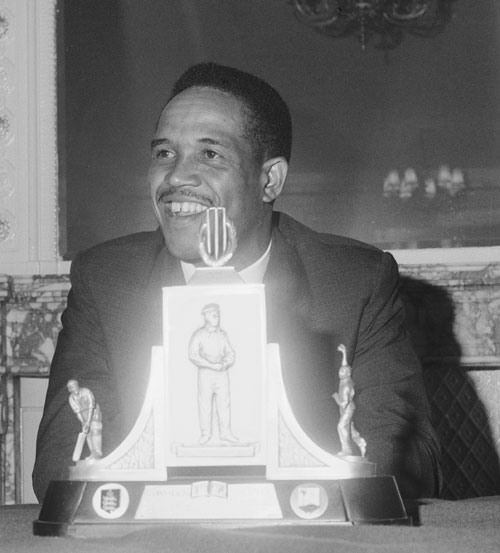 Garry Sobers sits behind the Wisden Trophy during a press reception