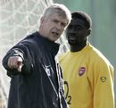 Arsene Wenger instructs Kolo Toure