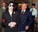 Michael Jackson is shown around by Mohammed Al Fayed