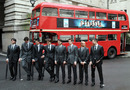 The world's top eight players pose in front of a London bus