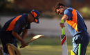 Ricky Ponting and Michael Clarke exchange bats at Australia's training session