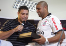 Corinthians' new signing Adriano is welcomed by their former player Ronaldo