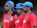 Ashish Nehra, Sreesanth and Zaheer Khan look on during a training session