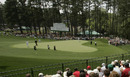 Patrons enjoy the action on the 3rd green 