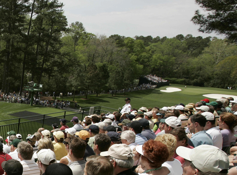 Patrons overlook the fourth hole at Augusta