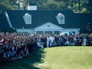 Dustin Johnson tees off in front of packed crowds on the first tee