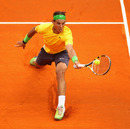 Rafael Nadal stretches for a volley