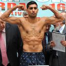 Amir Khan weighs in ahead of his fight with Paul McCloskey
