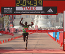 Emmanuel Mutai crosses the finish line