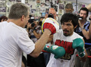 Manny Pacquiao works through a sparring session with coach Freddie Roach