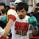 Manny Pacquiao spars with trainer Freddie Roach