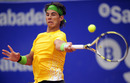 Rafael Nadal returns the ball to Gael Monfils