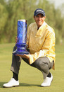 Nicolas Colsaerts poses with the China Open trophy