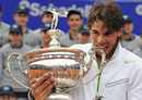 Rafael Nadal gets his teeth into the trophy