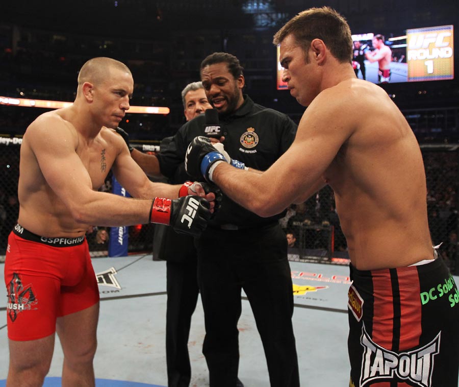 Georges St-Pierre and Jake Shields touch gloves