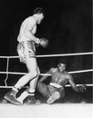 Henry Cooper knocks Muhammad Ali to the ground