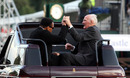 Muhammad Ali and Sir Henry Cooper wave to the crowd