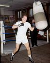 Henry Cooper at work on the punchbagknighthood