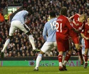 Emmanuel Adebayor scores against Liverpool