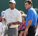 Tiger Woods and Nick Faldo stare into the distance