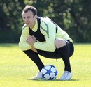Dimitar Berbatov takes a breather during a training session