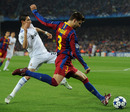 Gerard Pique clears the ball away from Angel Di Maria