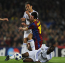 Lionel Messi is tackled by Lassana Diarra and Ricardo Carvalho 