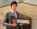 Alastair Cook with his Freedom of the City of London certificate 