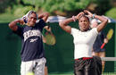 Venus and Serena Williams prepare for a practice game
