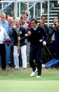 Seve Ballesteros celebrates after judging his chip from the edge of the 18th green to perfection