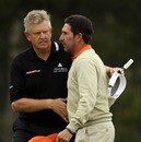 Colin Montgomerie consoles Jose Maria Olazabal on the 18th green