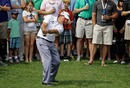 Phil Mickelson flops the ball onto the green