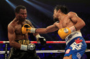 Manny Pacquiao plants one on Shane Mosley