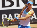 Lucie Safarova climbs into a backhand