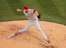 Roy Halladay winds up a pitch