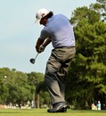 Phil Mickelson hits his tee shot on the 15th hole