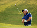 Graeme McDowell plays out of a bunker