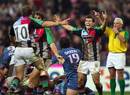 Harlequins' Danny Care and Nick Evans celebrate victory over Stade Francais