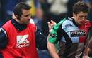 Harlequins wing Tom Williams is escorted from the field