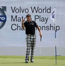Ian Poulter throws back the ball