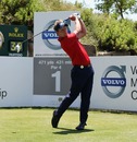 Luke Donald hits his tee-shot on the first hole 