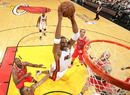Chris Bosh of the Miami Heat drives for the basket