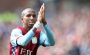 Ashley Young gestures to Aston Villa fans