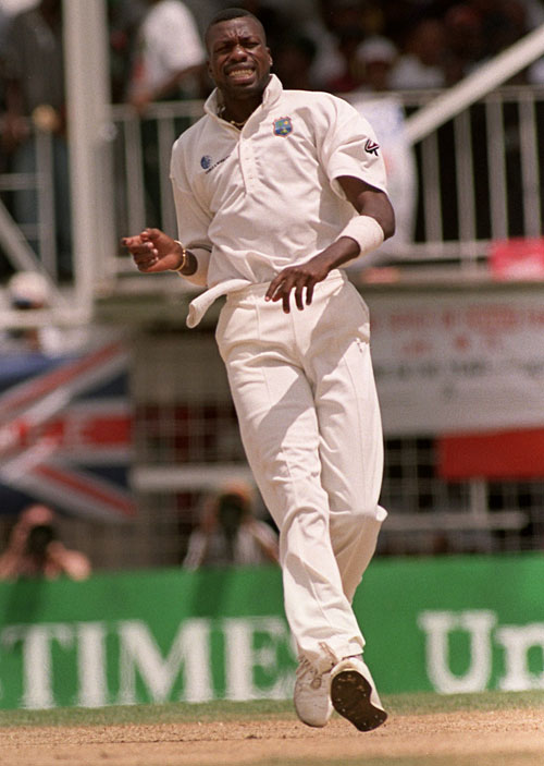 Curtly Ambrose celebrates a wicket