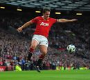 Gary Neville tries to control the ball